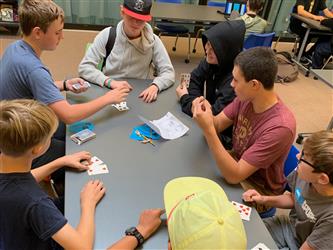 boys playing cards